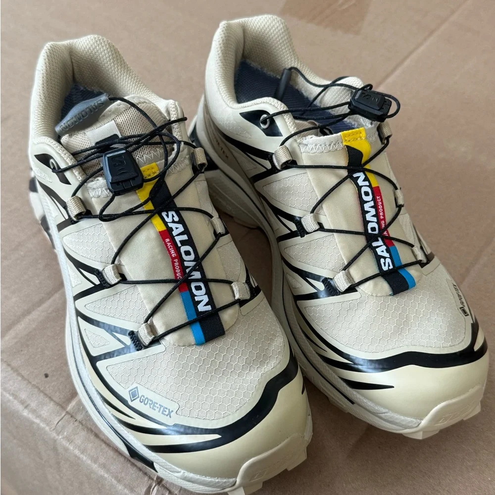 Salomon Men's Beige White Black Athletic Shoes with Yellow & Blue Accents